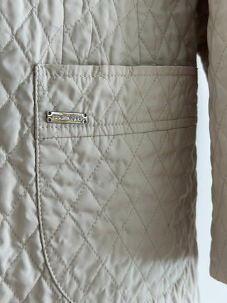 Scoop pocket quilted jacket