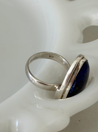 Offset oval lapis lazuli ring