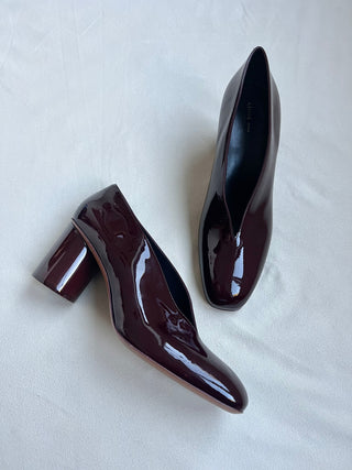 Deep cut block heel courts