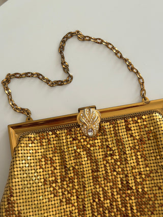 Gold mesh kiss-lock evening wristlet