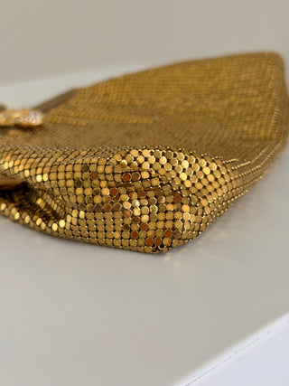 Gold mesh kiss-lock evening wristlet