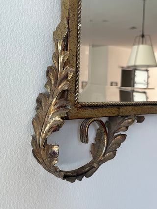 Rococo-style metal scrolled mirror