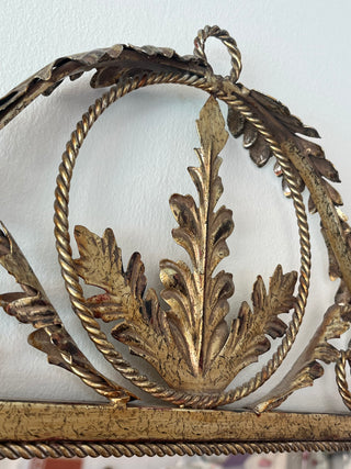 Rococo-style metal scrolled mirror