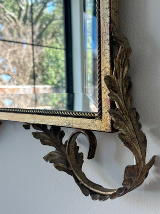 Rococo-style metal scrolled mirror