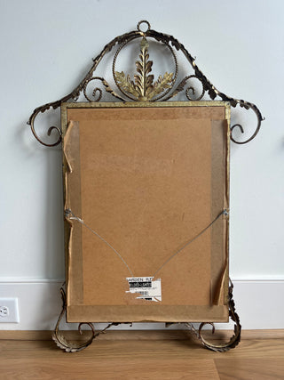 Rococo-style metal scrolled mirror