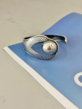 Open snake eye cuff bracelet