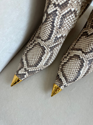 Gold tipped python leather boots