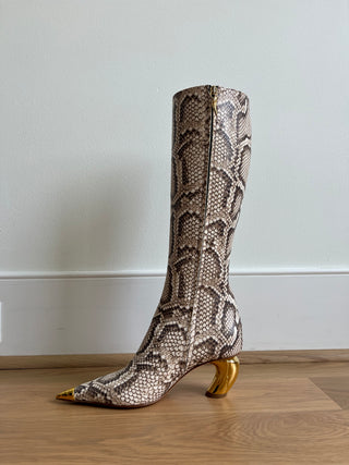 Gold tipped python leather boots