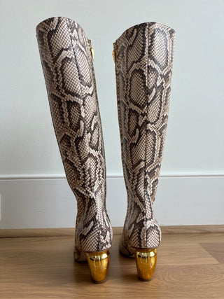 Gold tipped python leather boots