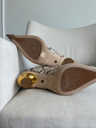 Gold tipped python leather boots