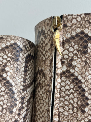 Gold tipped python leather boots