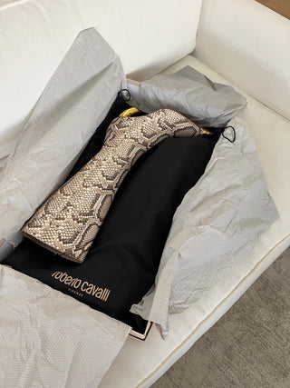 Gold tipped python leather boots