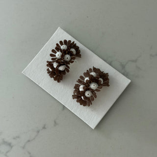 Taupe white blooming flower clip-ons