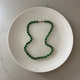 Green jade with gold beaded necklace