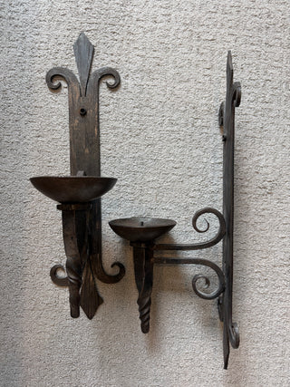 Forged iron wall candelabras